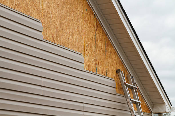 Professional Emergency Siding Repair technician working in Littlestown, PA